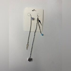 Chain earrings with dice, lightning bolt and leaf pendants